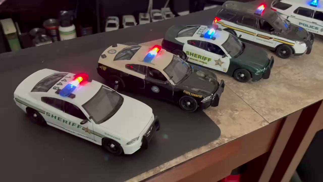 Sheriff and State Trooper die-cast model cars with lights